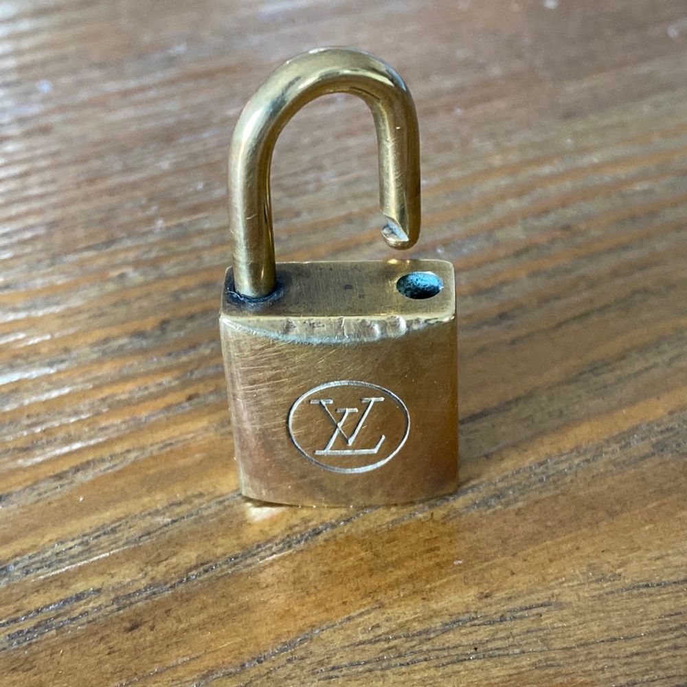 Louis Vuitton lock-authentic . No key, lock #223. some wear as shown in photos